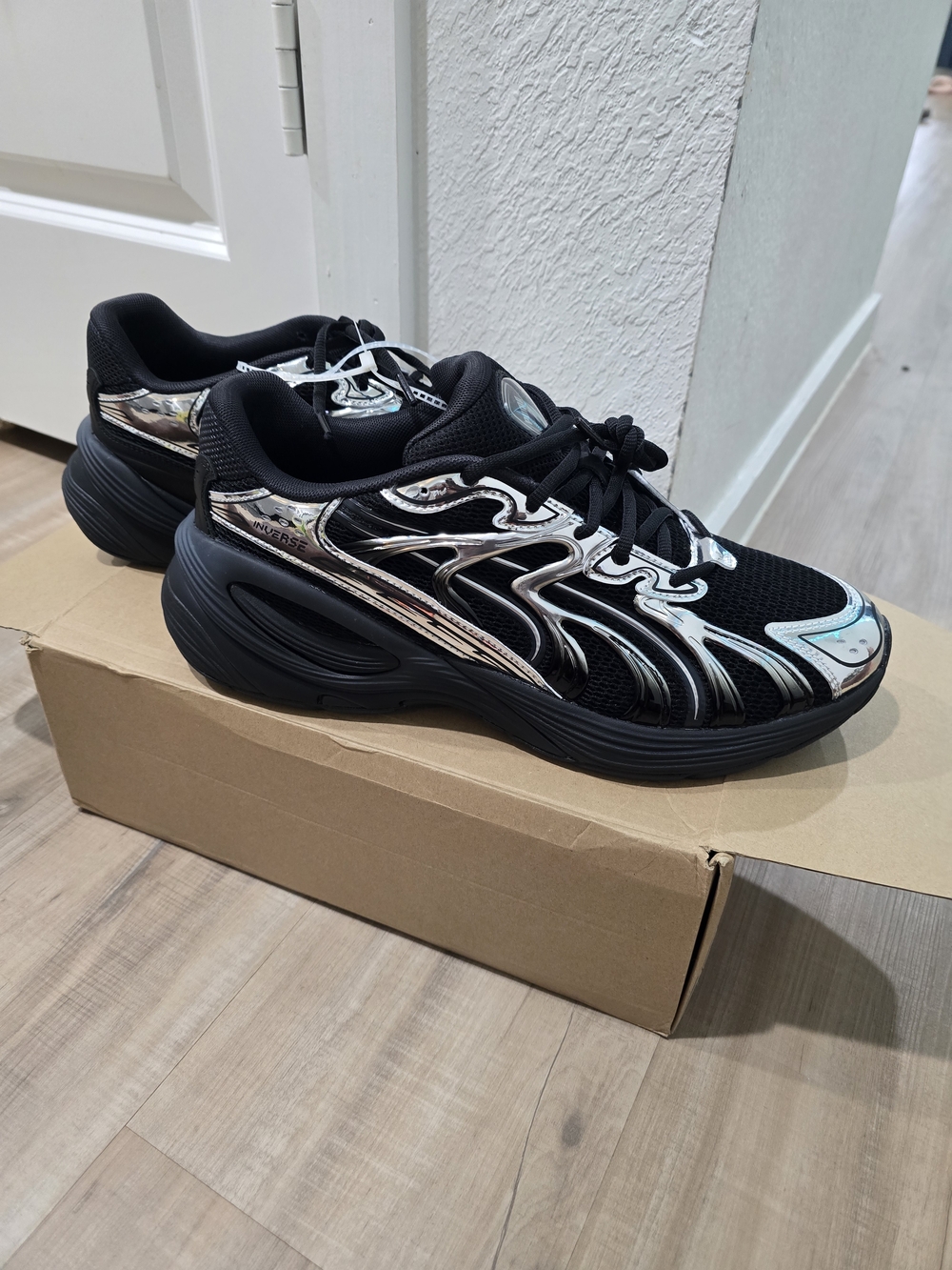 Puma Inverse Black Athletic Sneakers with Silver Metallic Accents